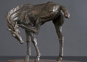 Scratching horse statue