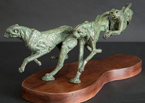 Cheetah stretching bronze statue