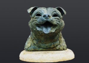 Bronze statue of a dogs head