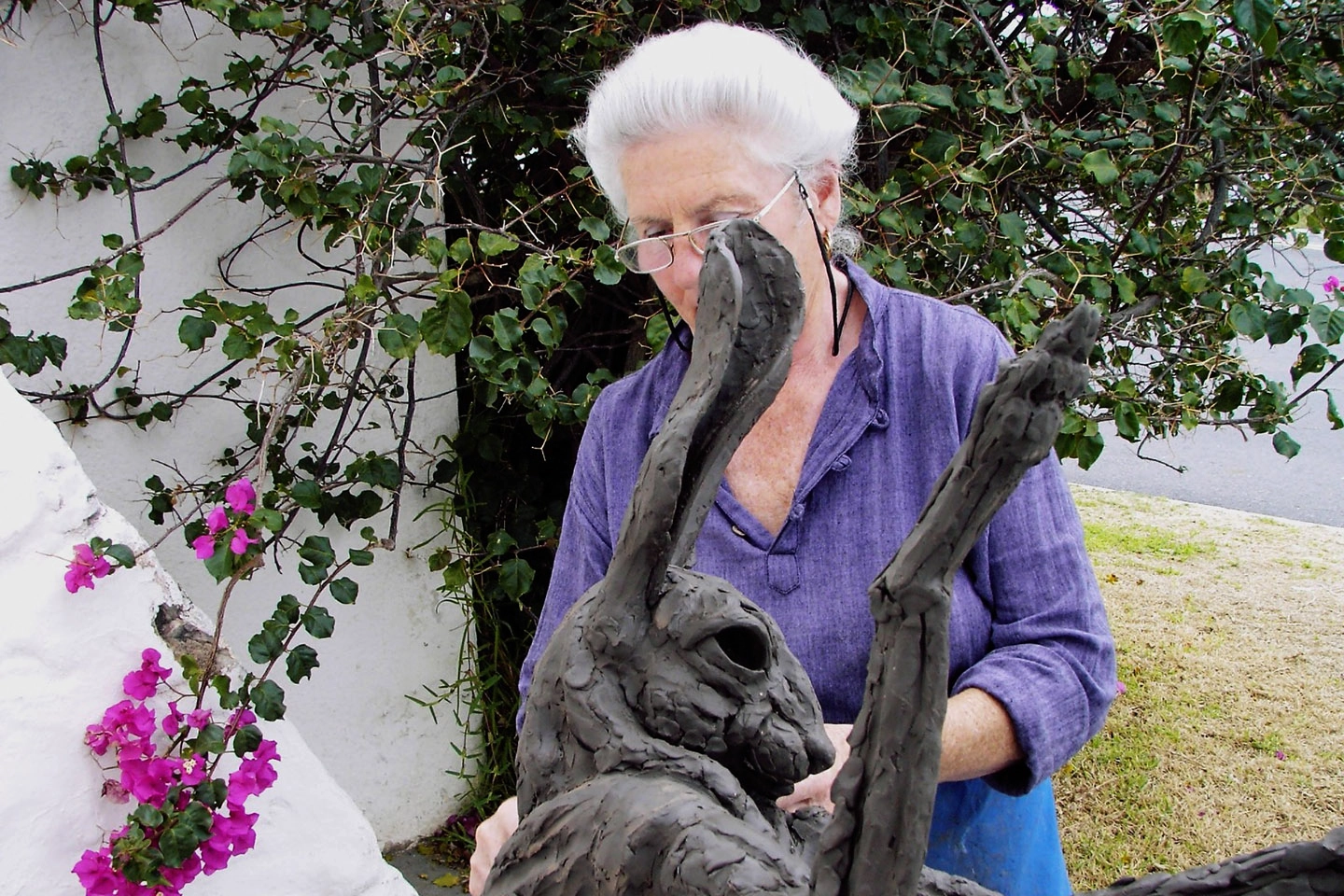 Jan Sweeney working on a hare sculpture in clay