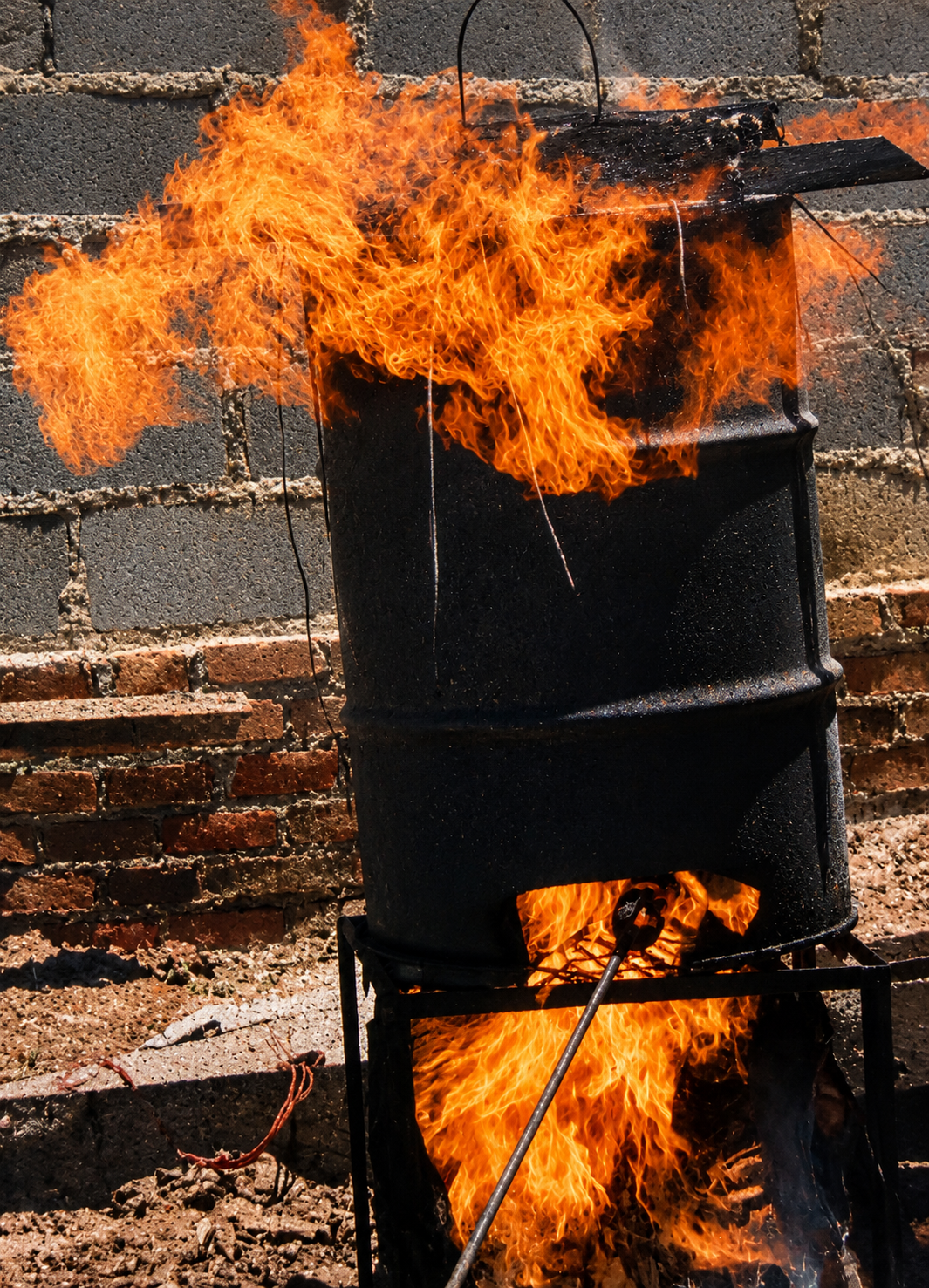 Burning out the wax — the drum on fire